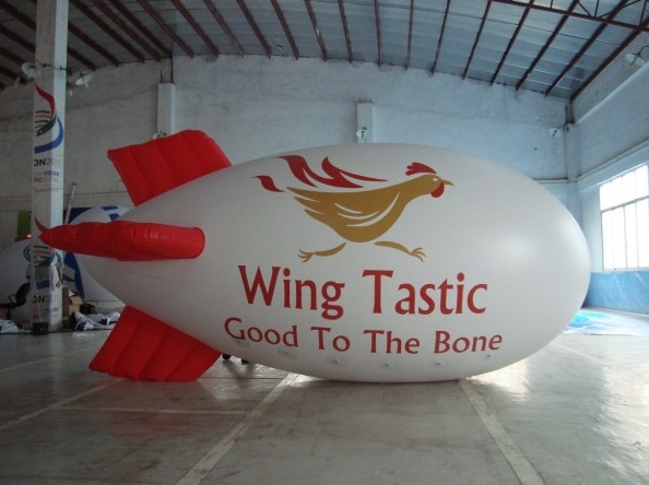White Advertising Wing Tastic Good To The Bone Blimp